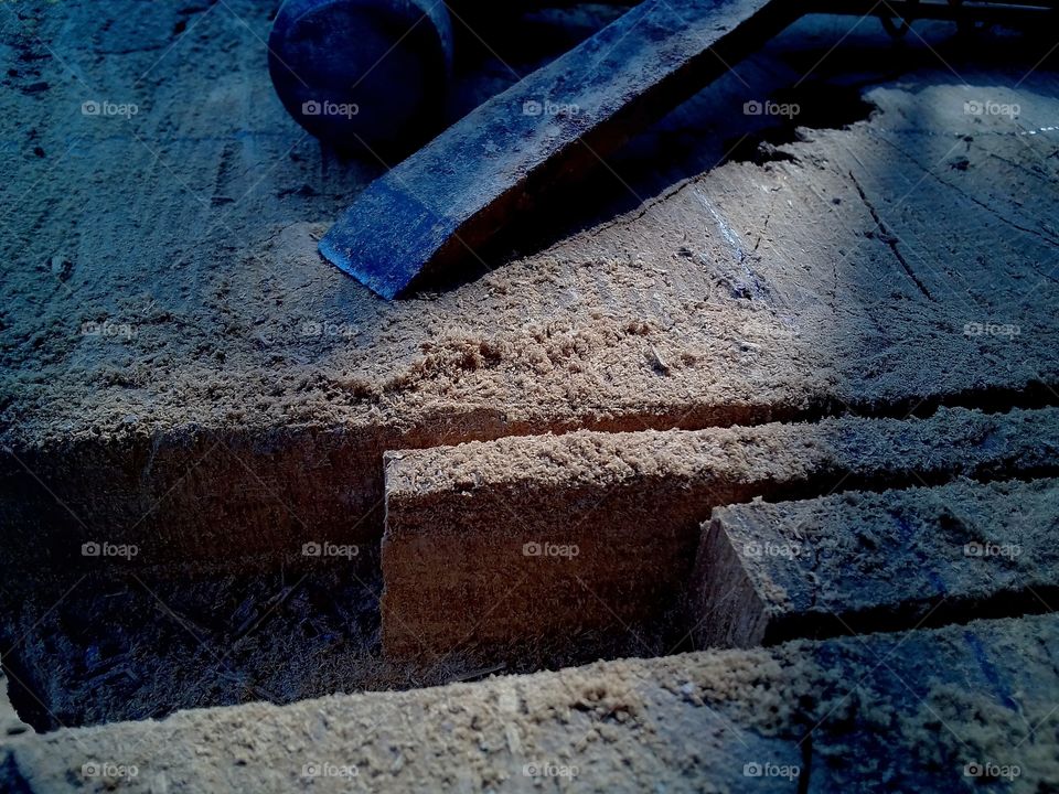 chisel , hammer and wooden