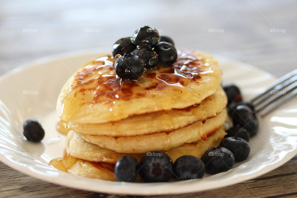 Fresh hot pancakes on a plate