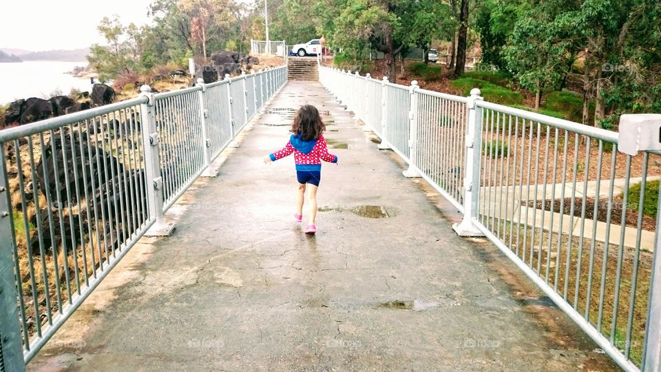 running on the dam bridge