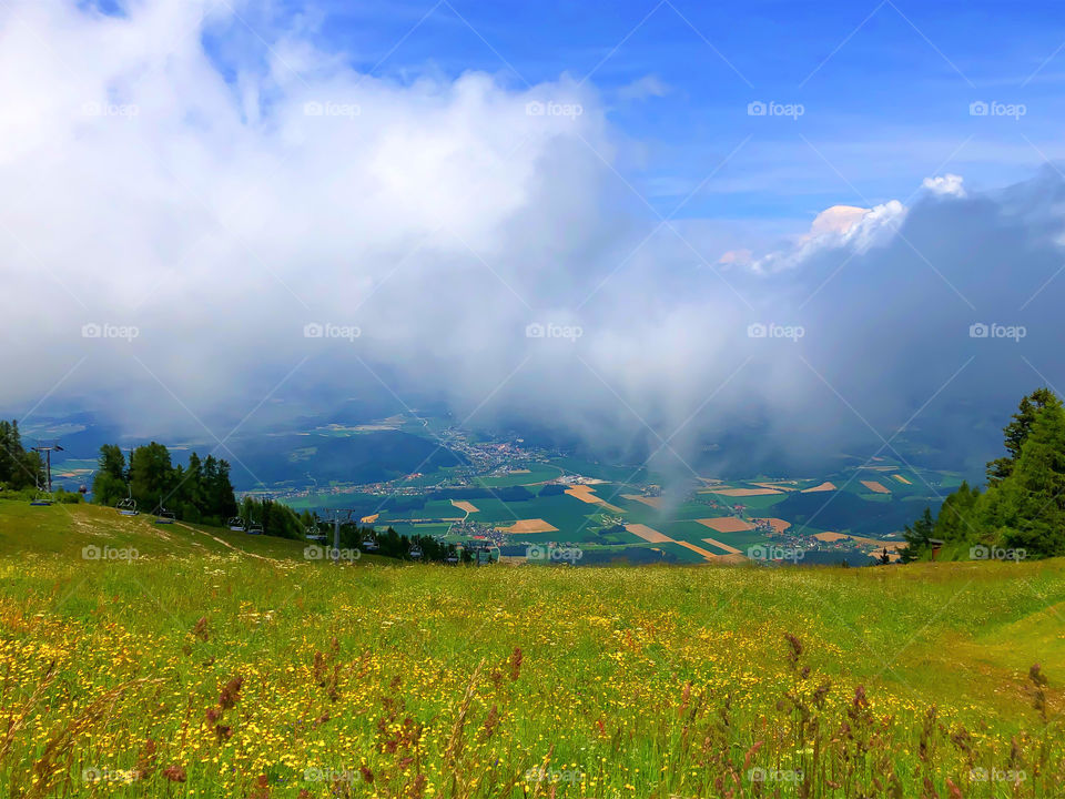 Outlook with clouds -Ski slope in the summer