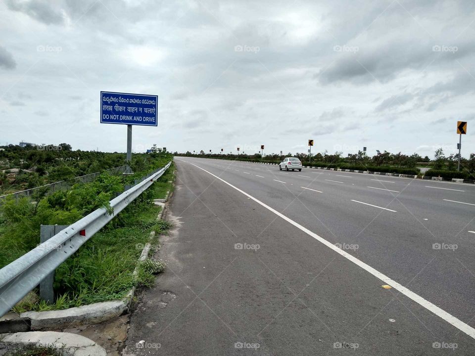 a sign board on the express highway