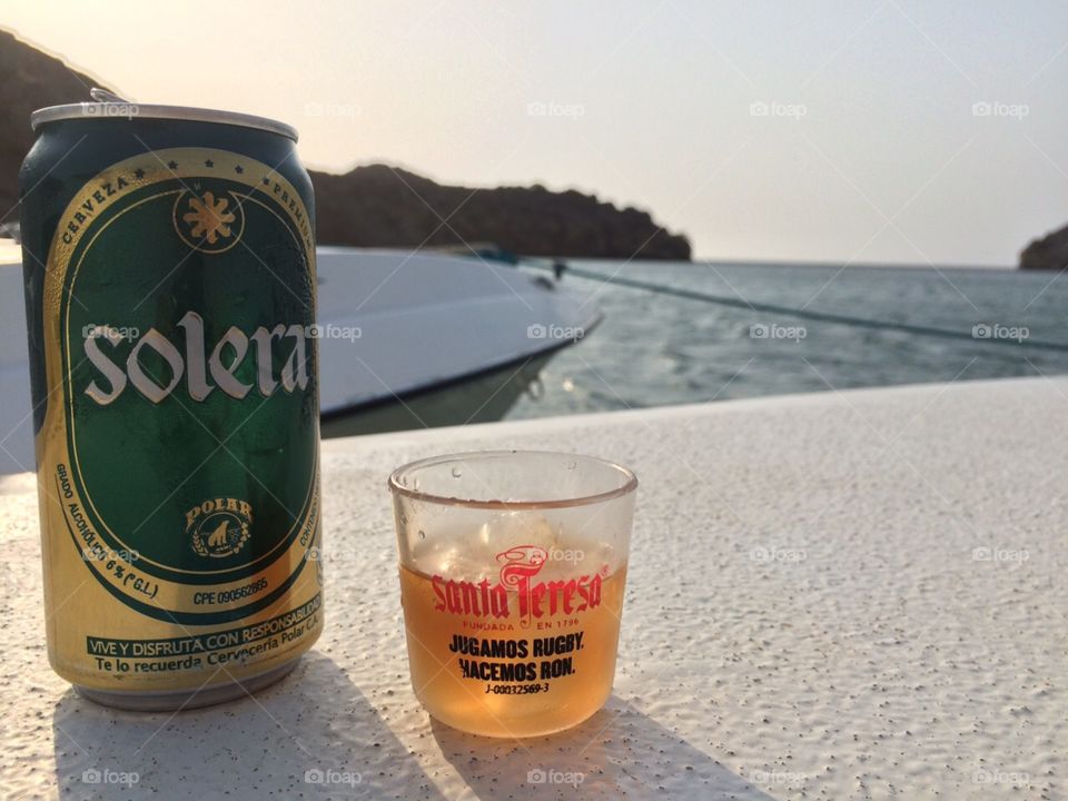 Having a drink by the beach 