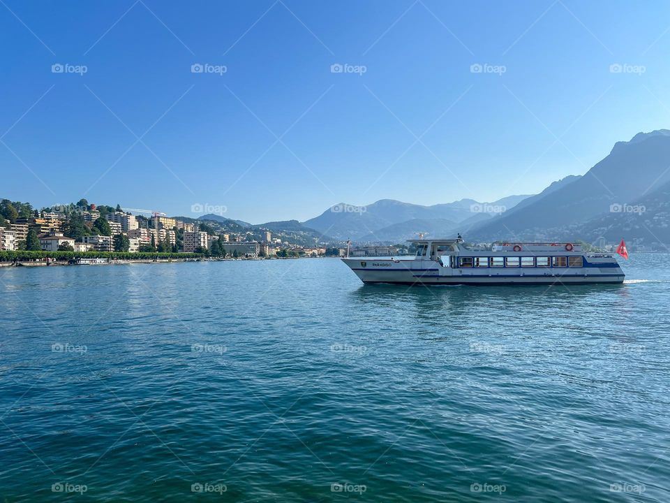 Ship on the lake between mountains