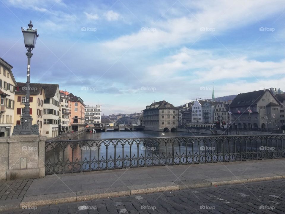 A view of Ill river on top of a bridge, in the largest city of eastern France.