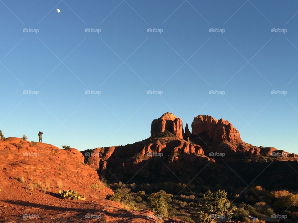 Person hiking to cathedral rock in Sedona