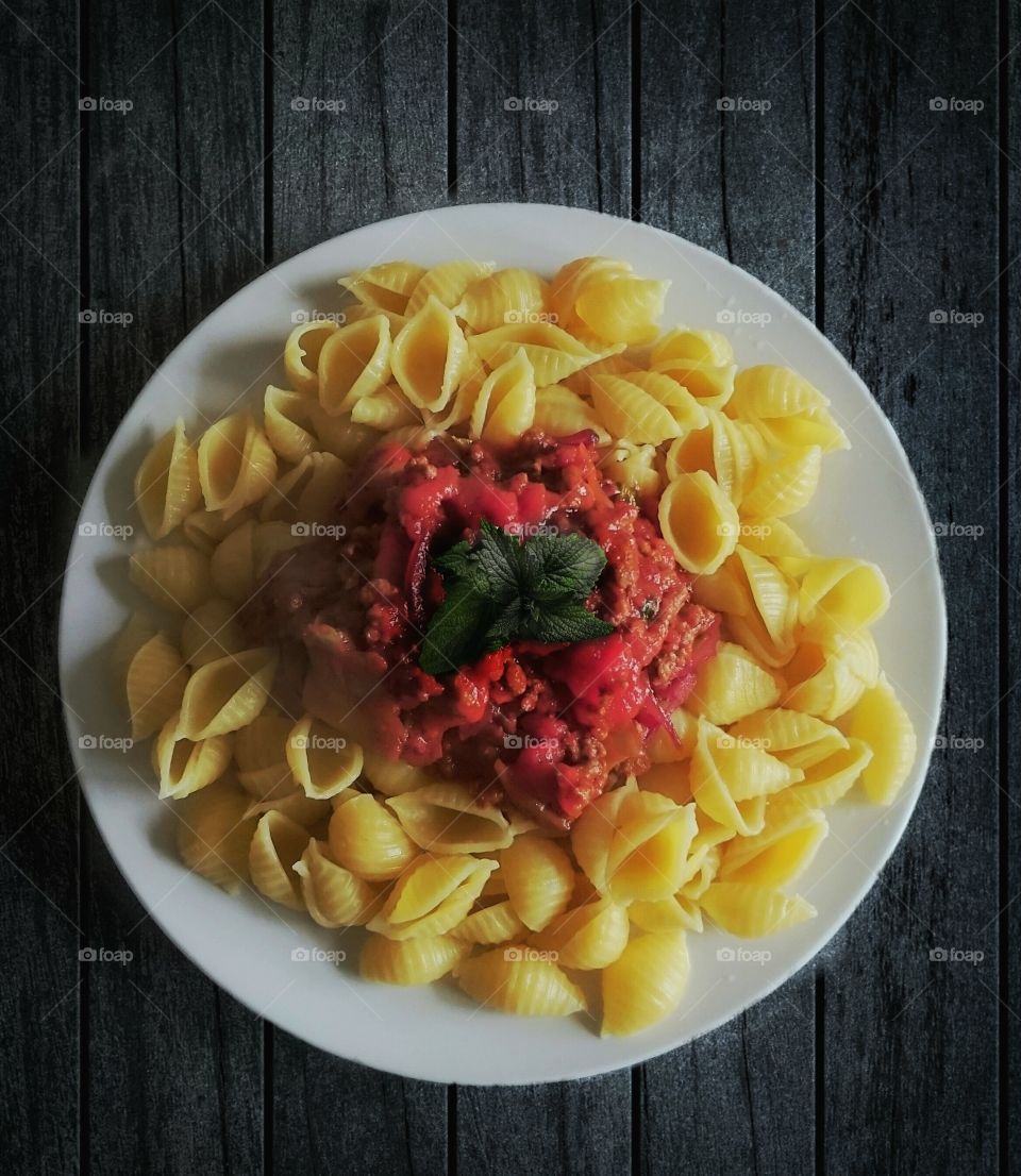 High angle view of delicious macaroni on plate