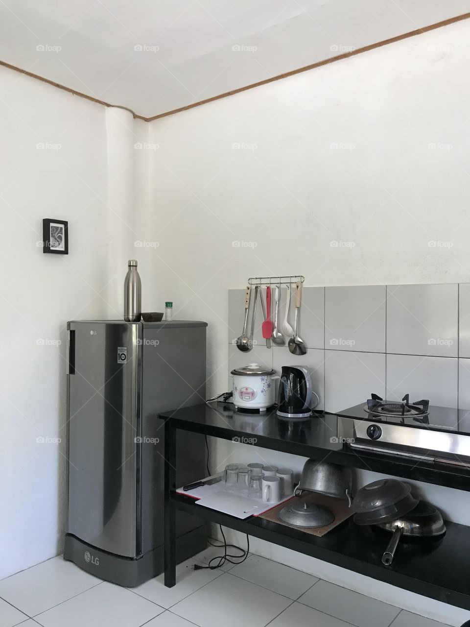 Simple kitchenette with refrigerator