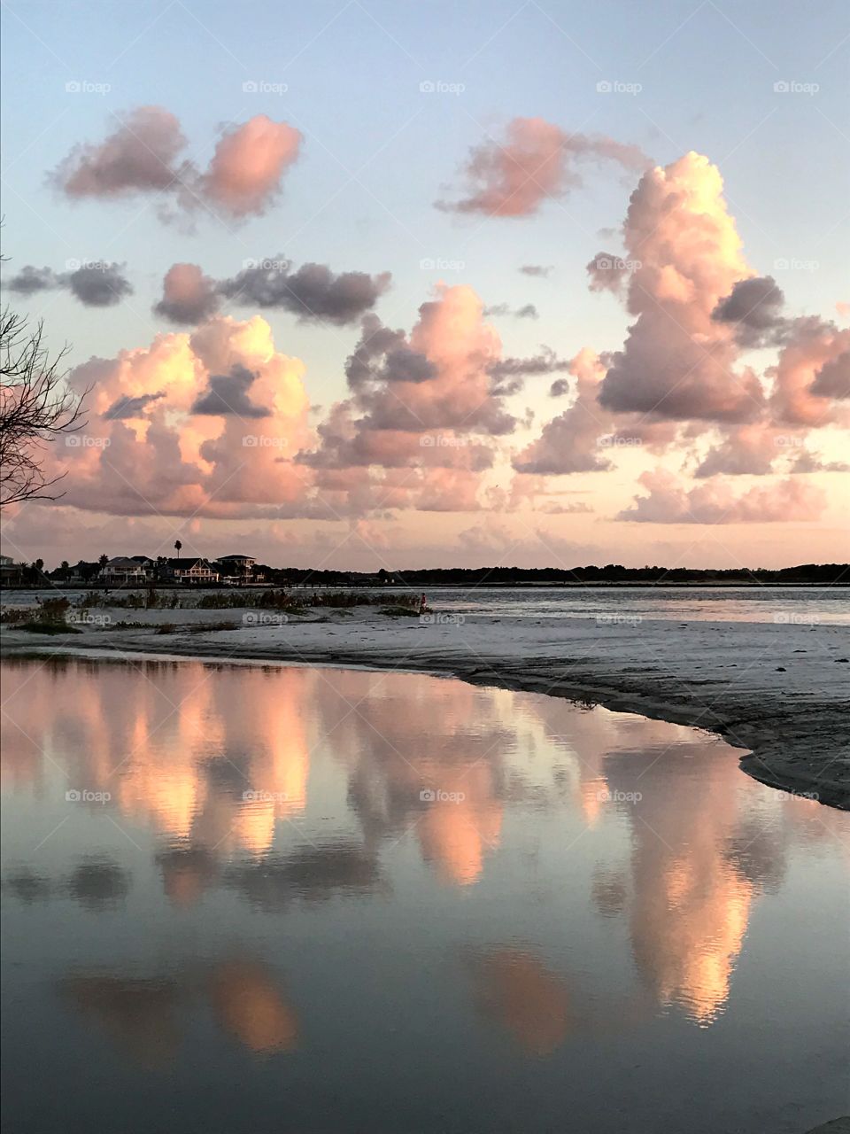 Cloud reflections at sunset