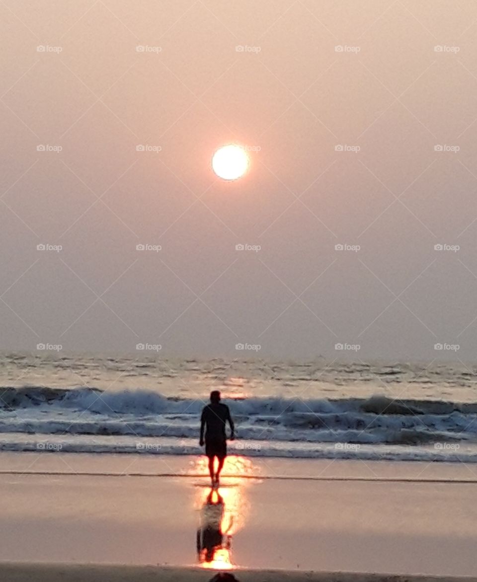 sunset on the beach of Leela Goa