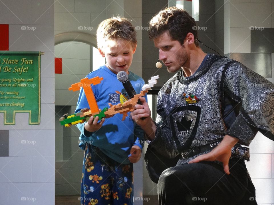 Show And Tell. Young Boy Proudly Showing Off His Creation
