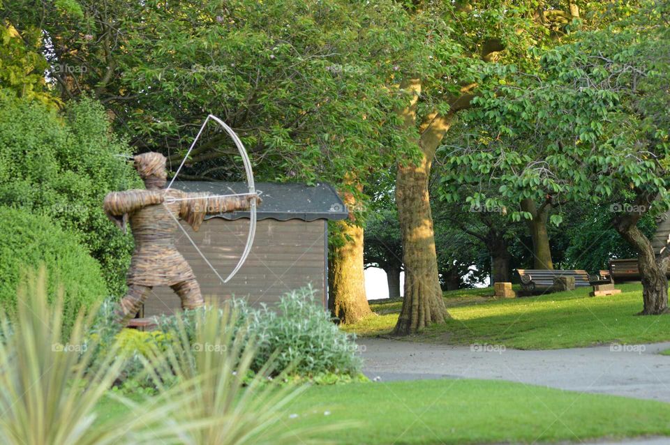 Wicker scalpture of Robin Hood in the gardens of the castle in Nottingham , England, UK