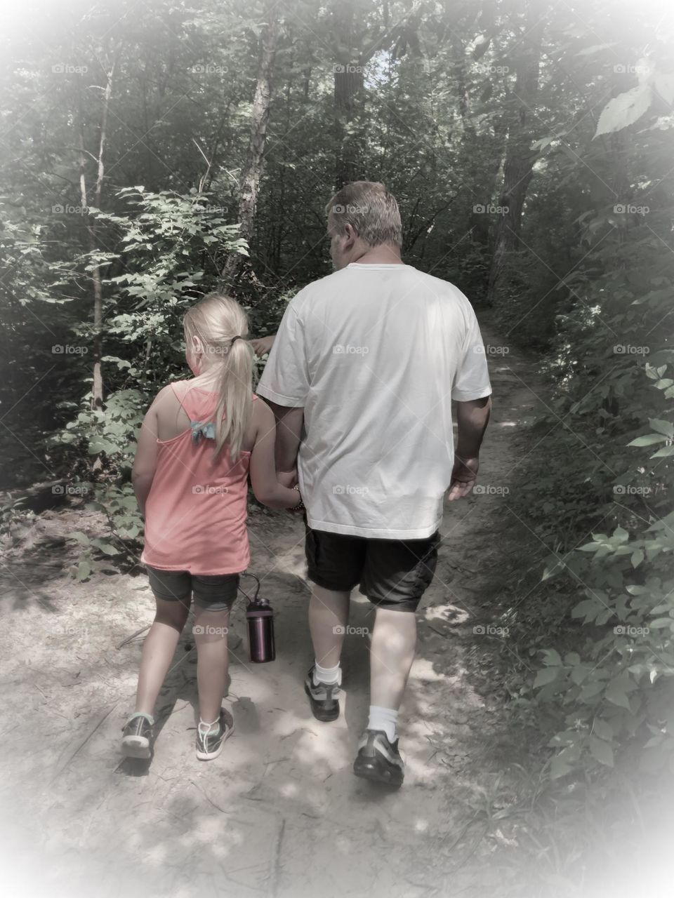 Father and daughter quality time hiking