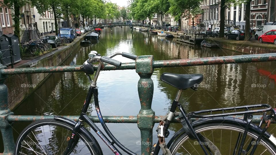 Bike on a canal Amsterdam