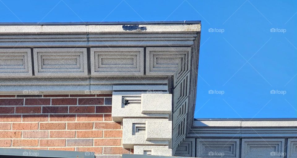 stone and brick Architectural ornamentation on roof of an office building in Oregon