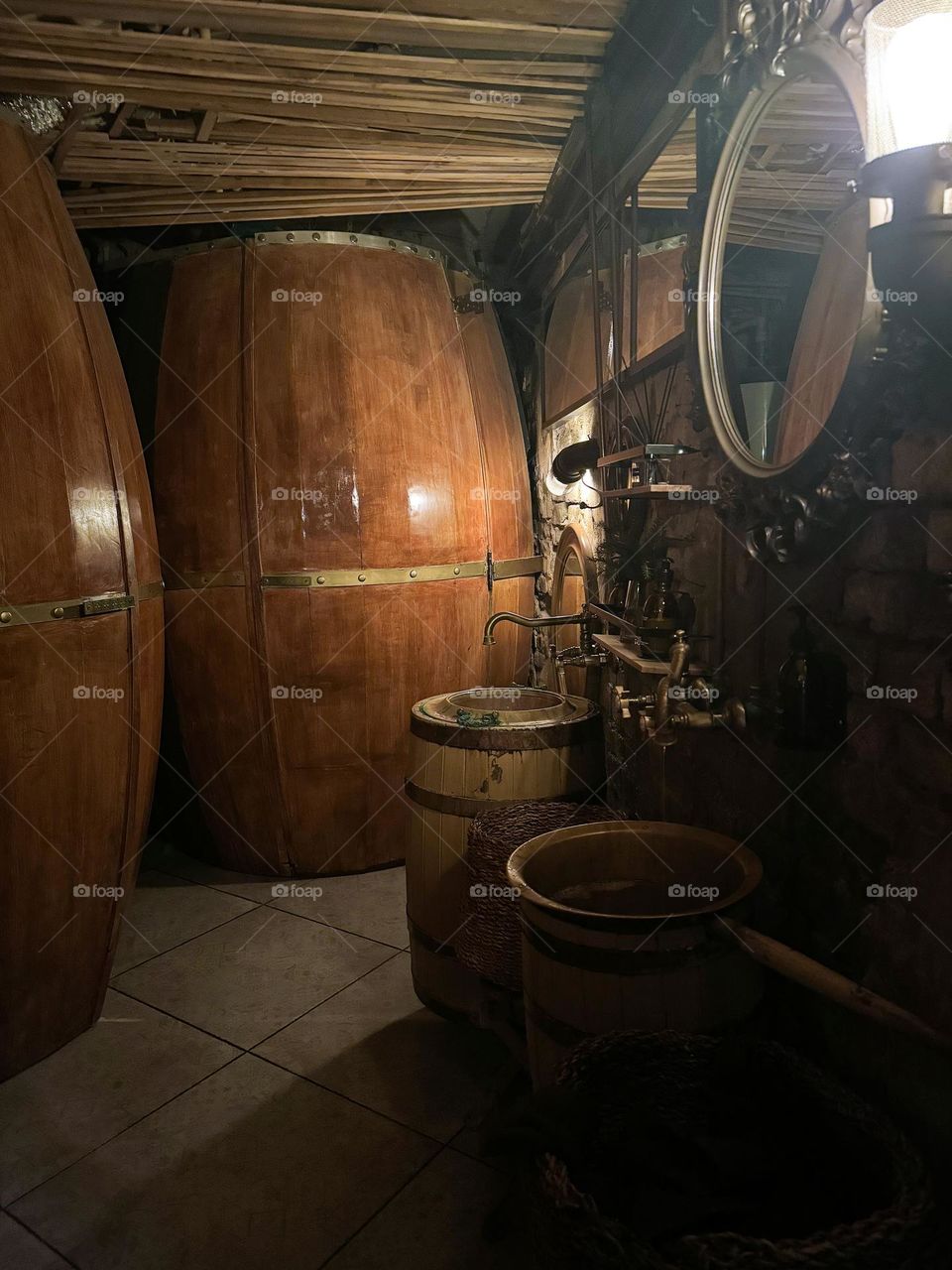 In the cellar there is a barrel of wine