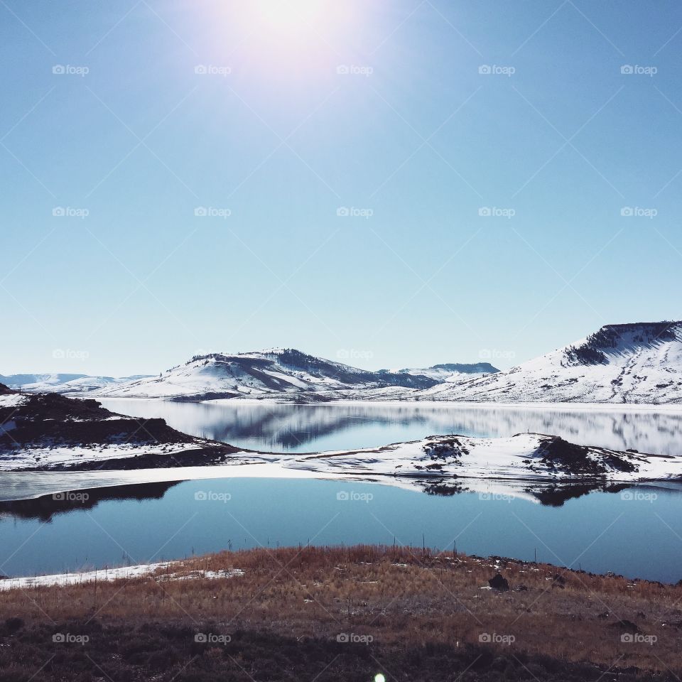 Reflection. Colorado frozen lake
