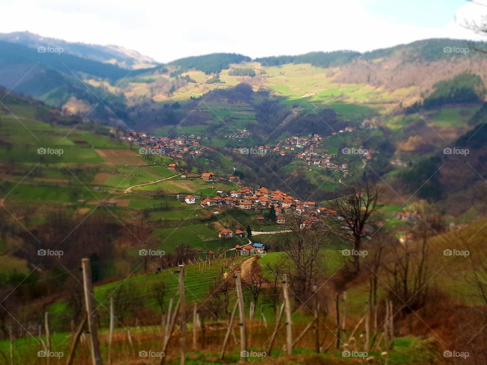 A big bosnian village Orahovica in mountians in april.