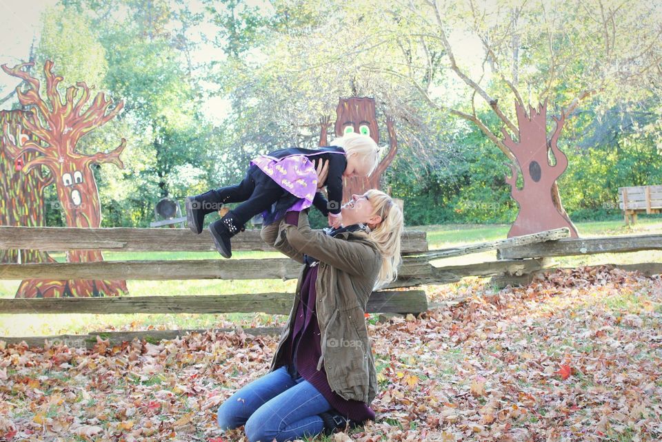 Mother and daughter enjoying fall