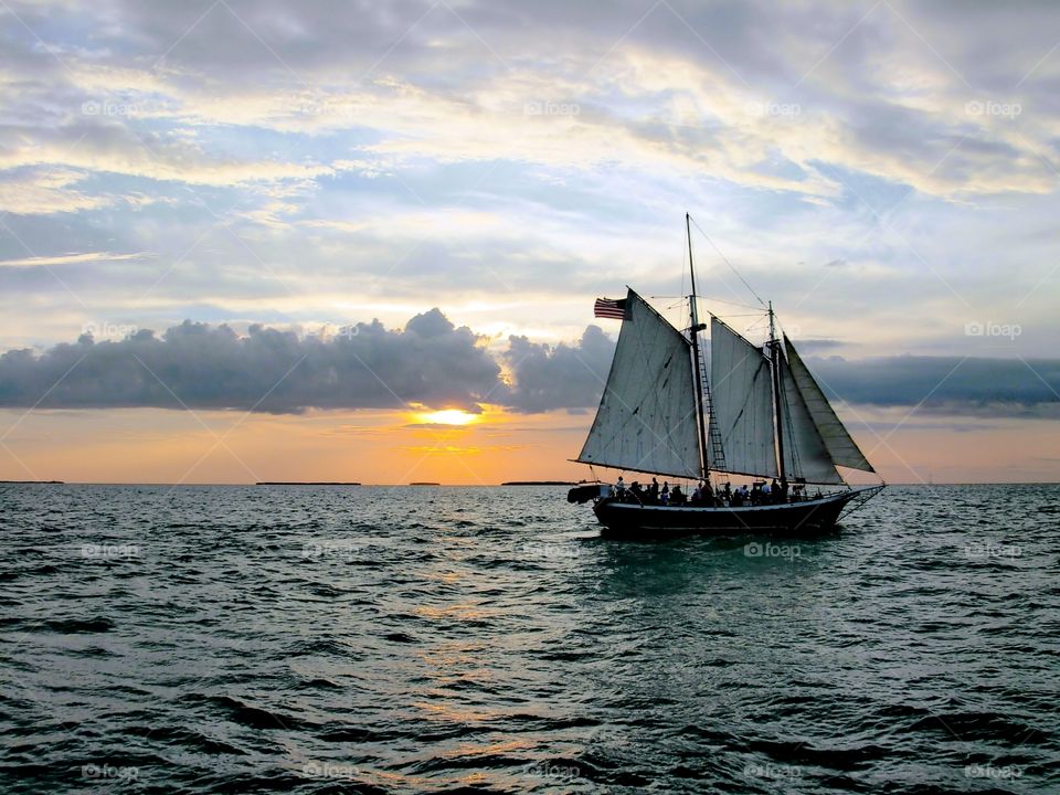 Sailing at Sunset in Key West. Sailing as sun is setting in the Florida Keys Key West Florida 