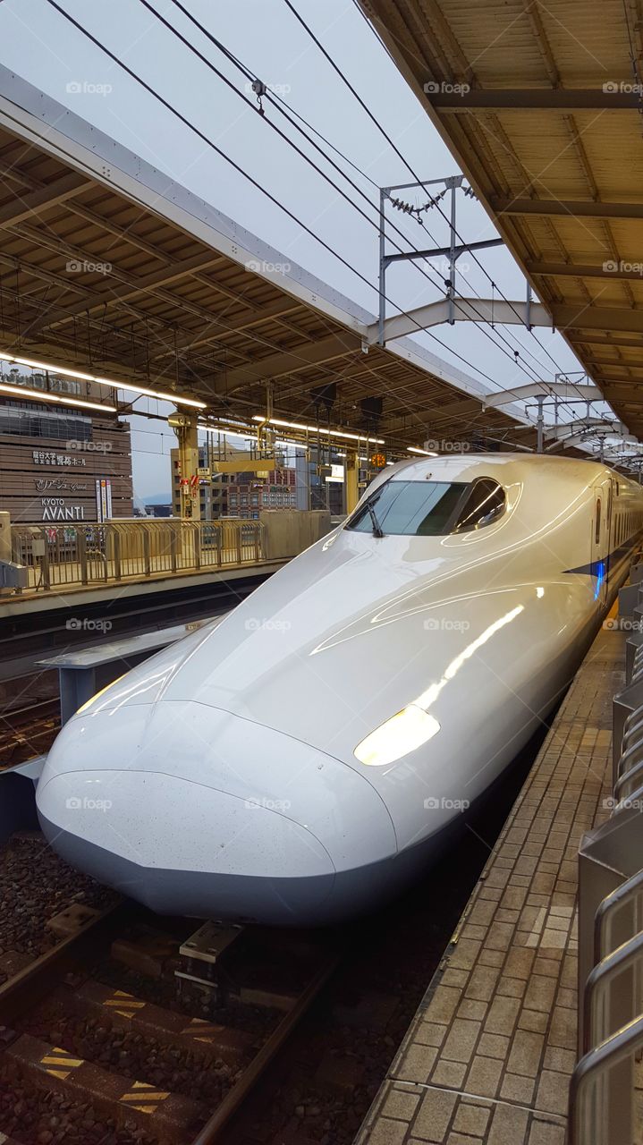 Taking the Shinkansen (bullet train) into Kyoto, Japan.