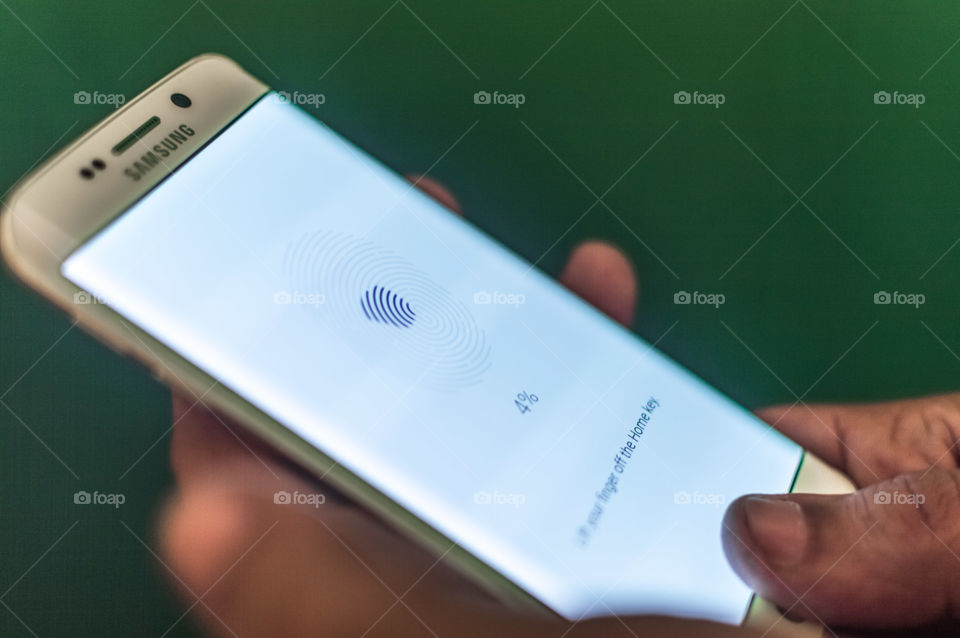 Phone 2 Fingerprint 1. Fingerprint scanner on a phone screen.