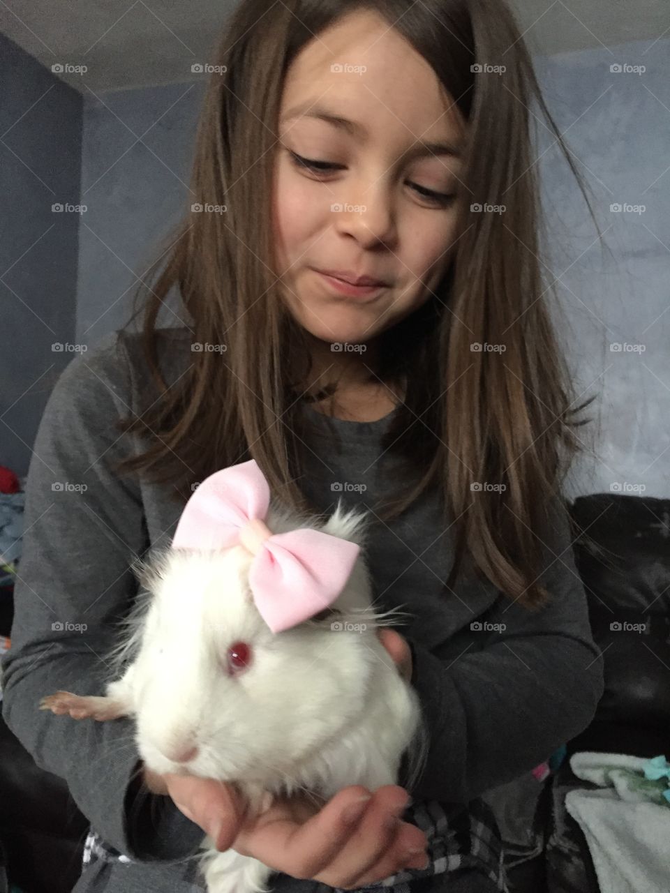A girl and her piggy