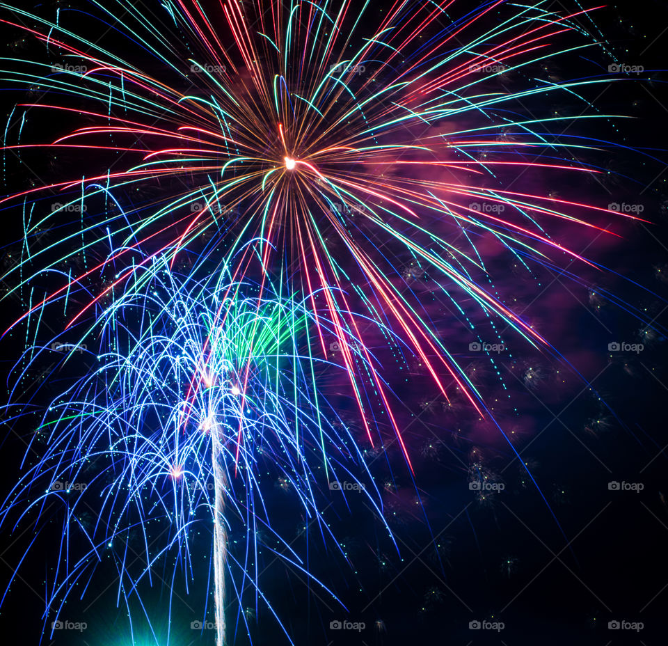 Firework exploding in sky at night