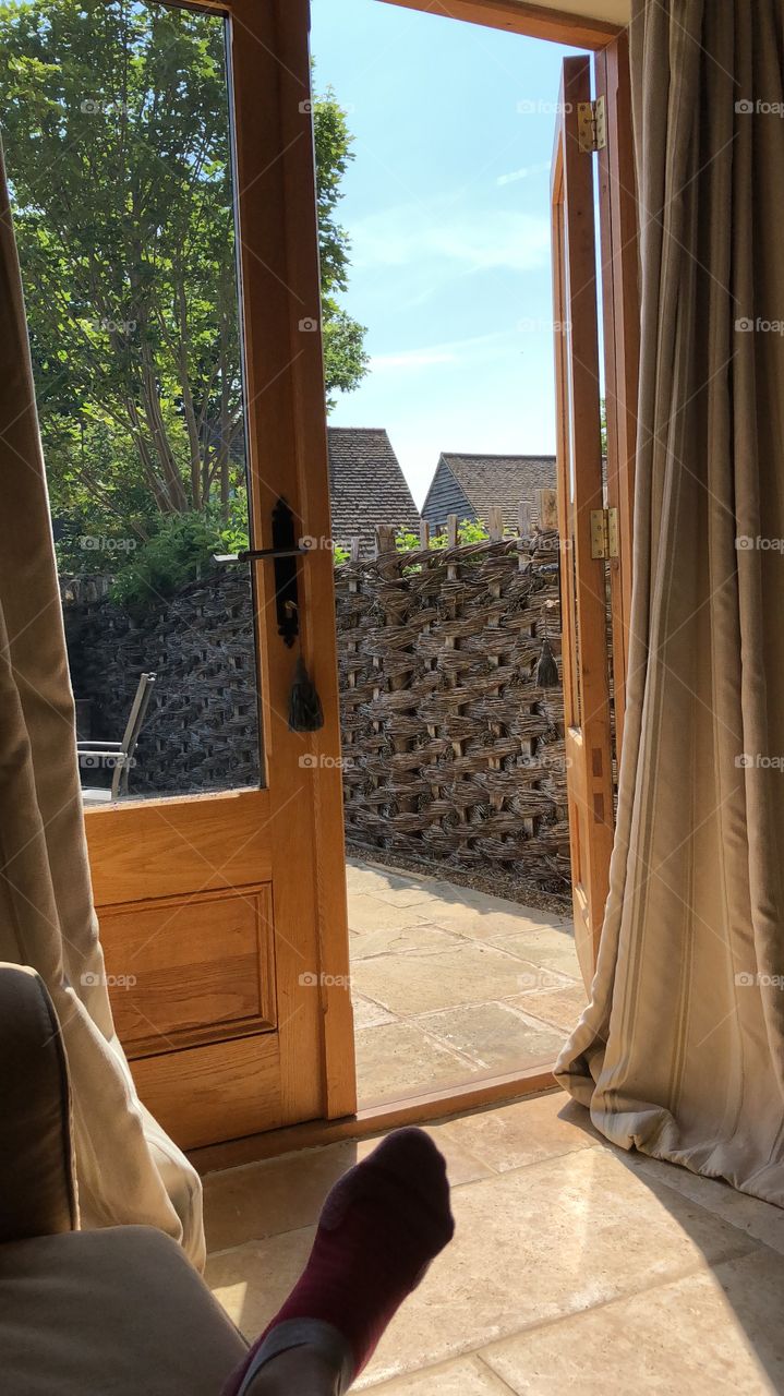 Open door in sunshine