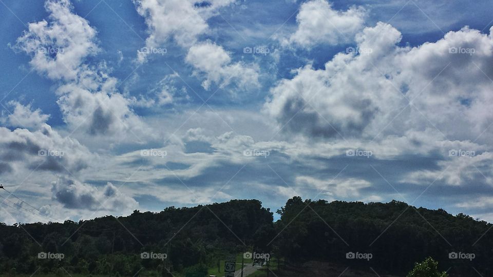 Blue Sky. Puffy clouds