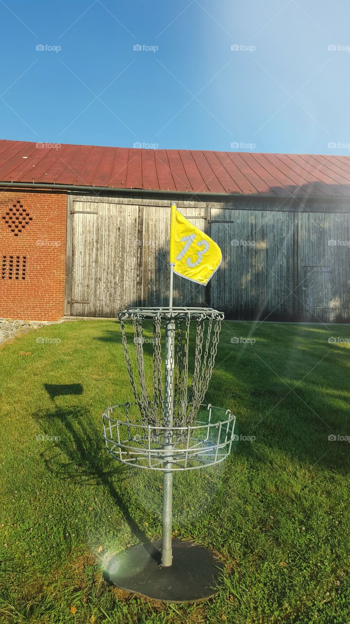 lucky hole #13. disc golf at local park,  hole #13