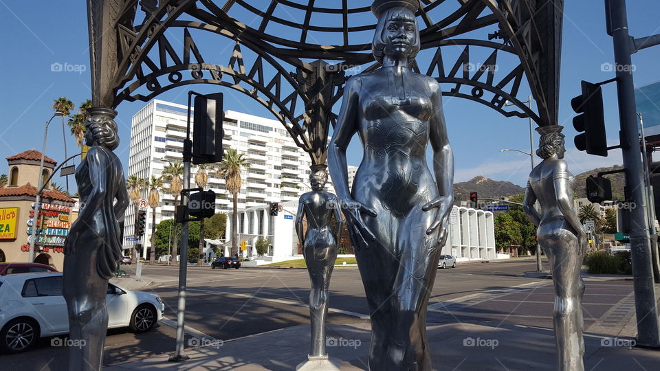 The Four Ladies of Hollywood gracefully hold the arched roof above them as they stand watch on Hollywood Boulevard.