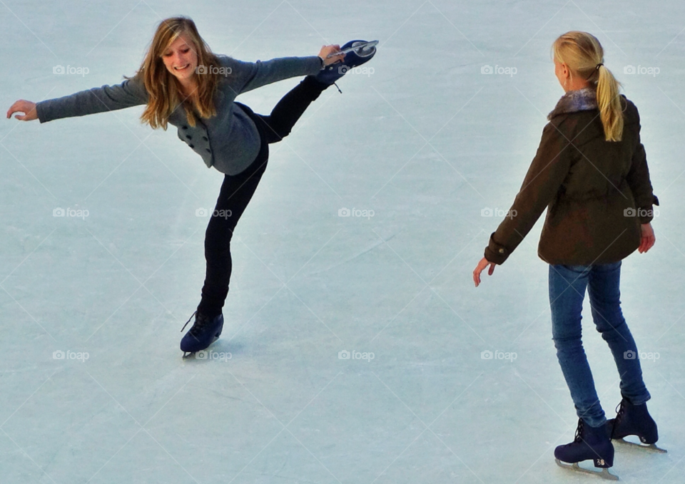 women ice skating rink rockefeller center by delvec