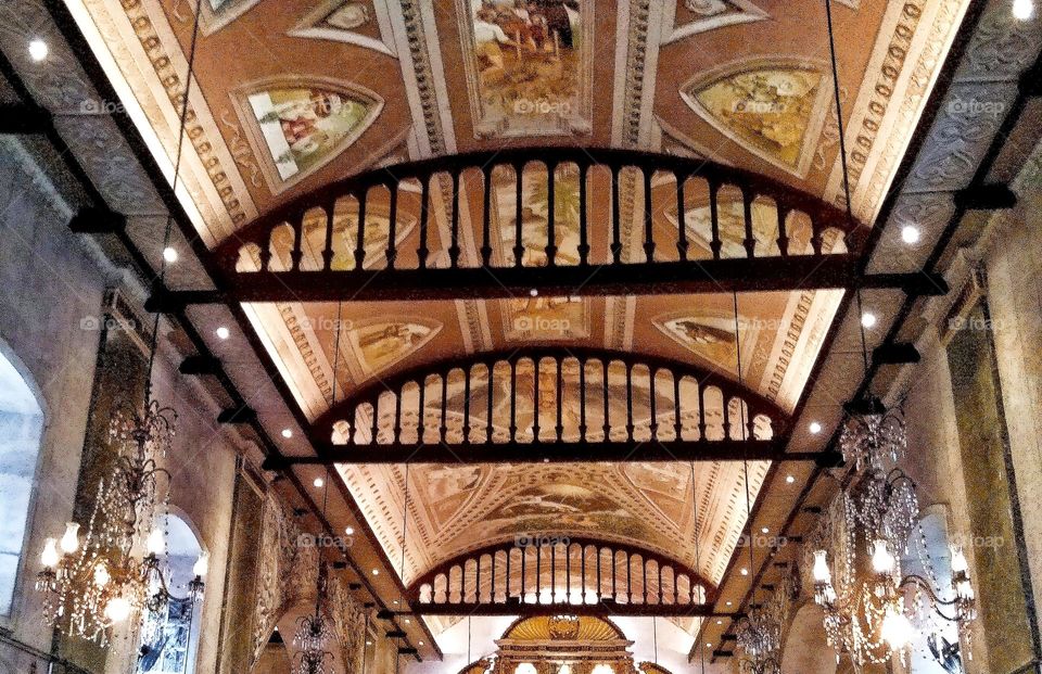 The beautiful wood art carving design of a historical church built in the year 1600.