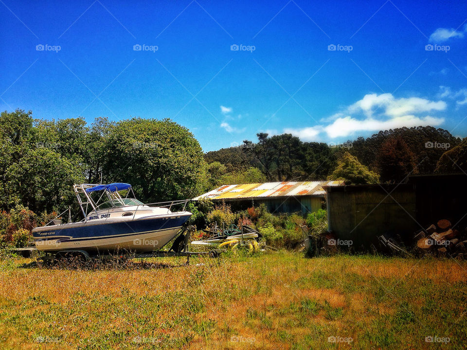 Landlocked boat on a rural American homestead