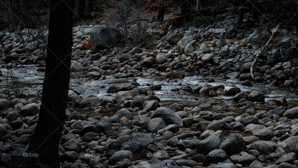 Pebbles and rocks in river