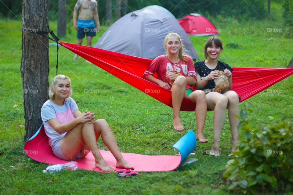 Girls in the hammock. Camping 