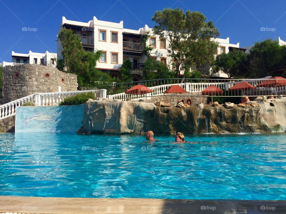 Relaxing in the swimming pool