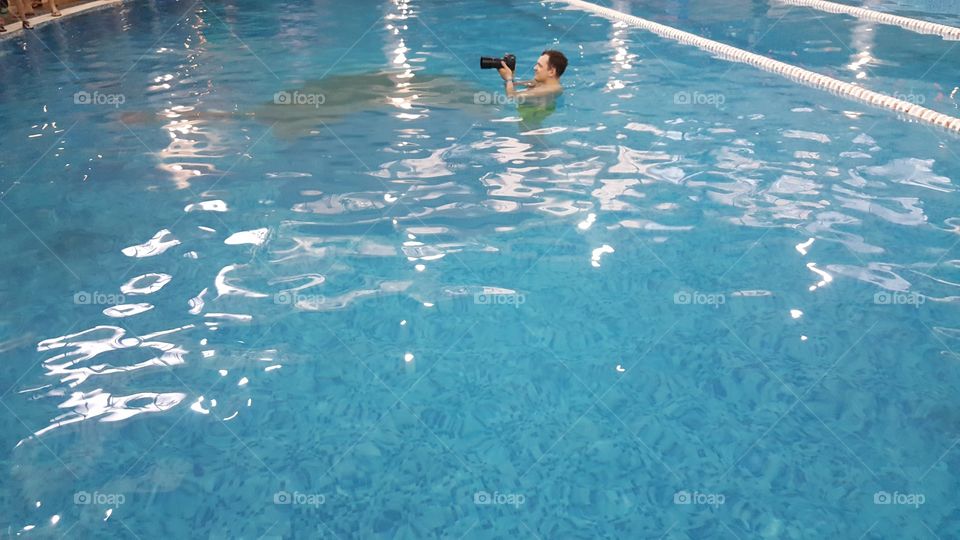 photographer in the pool