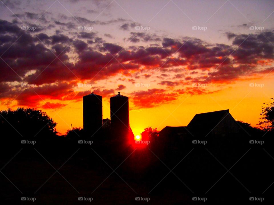 Sunset over an old farm. 