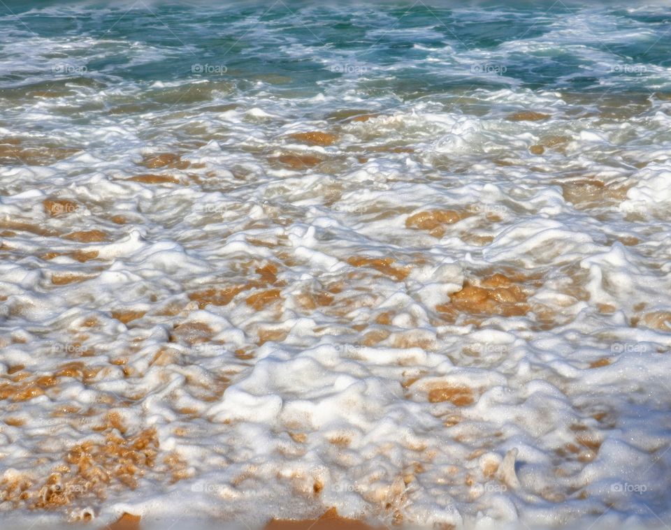 Beautiful tide. Surin Beach in Phuket Thailand.