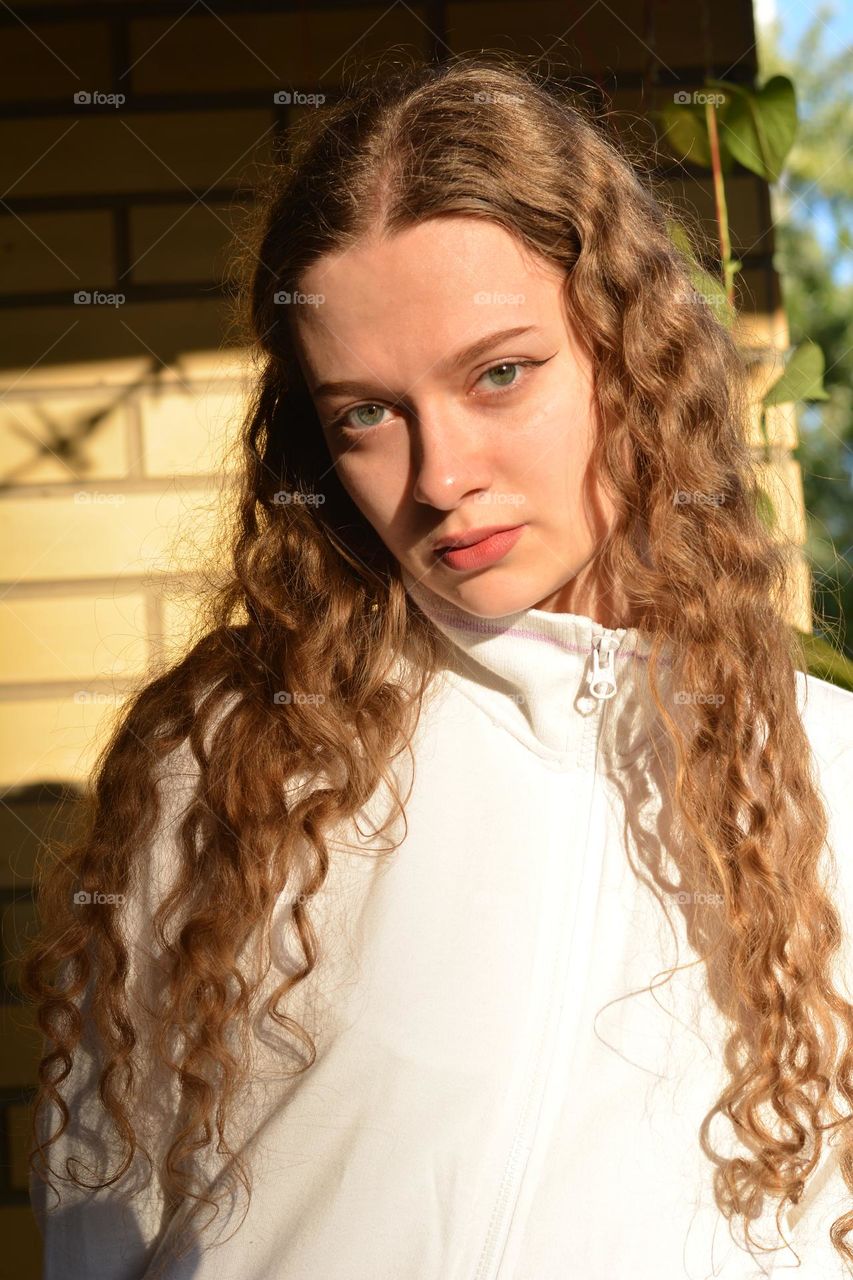 young girl beautiful portrait in sunlight