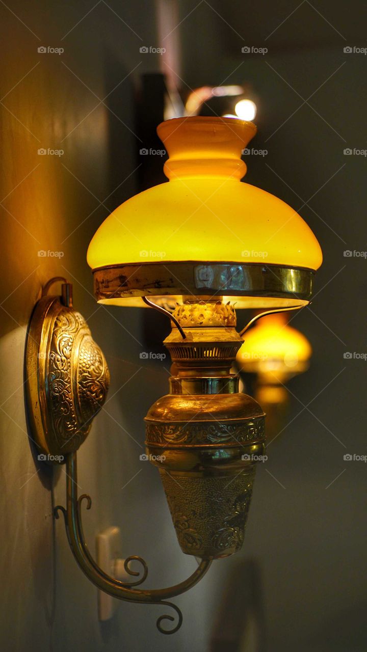 antique lamp inside the poeri devata hotel yogyakarta