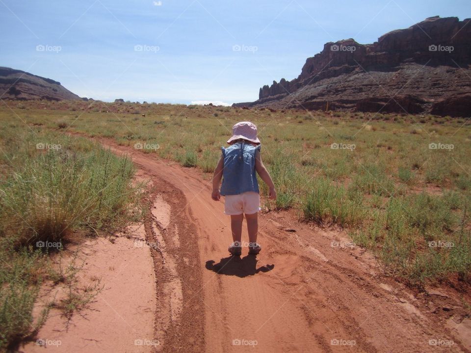 Little girl dirt road