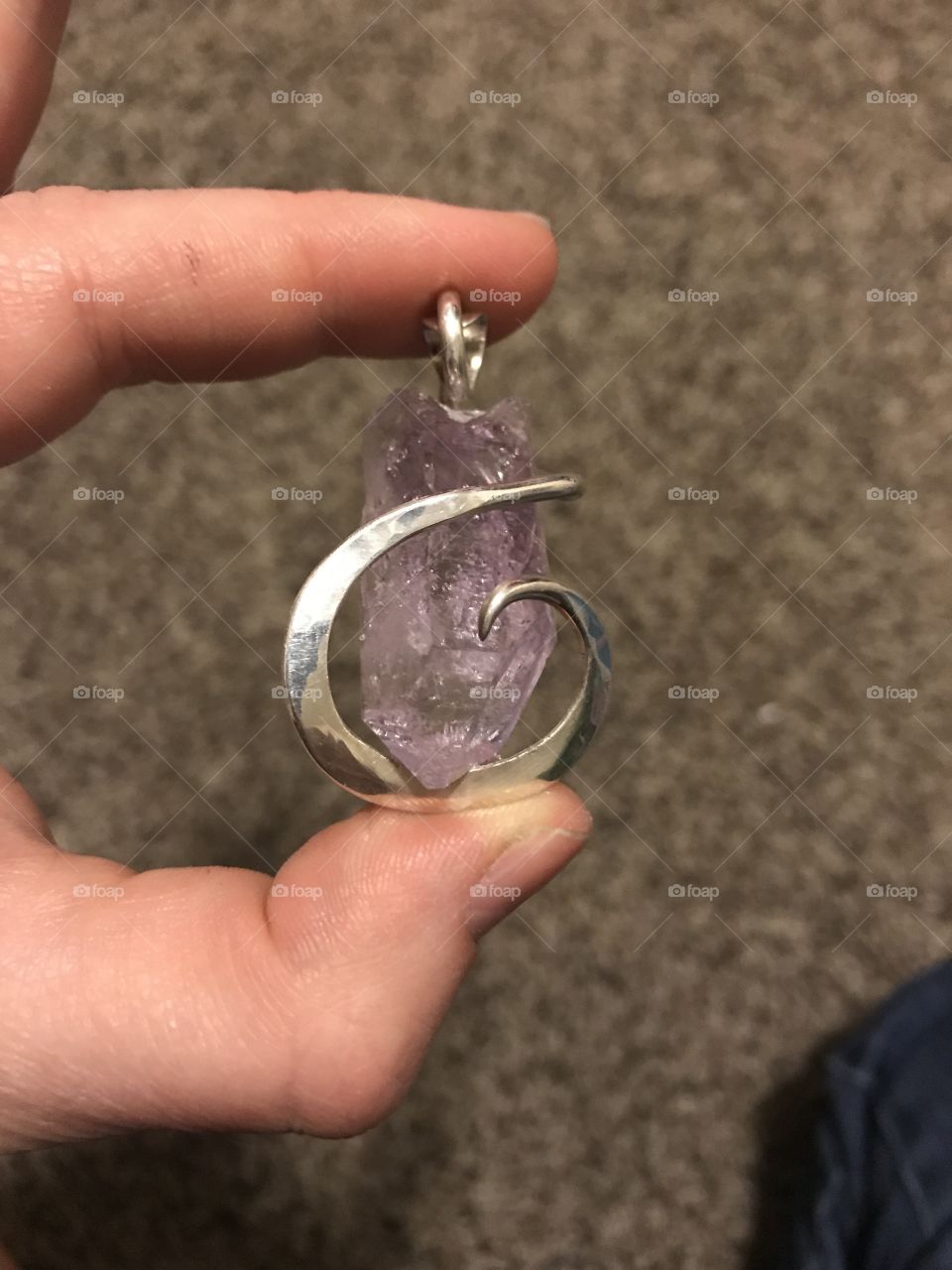 Hand wire wrapped amethyst in silver 