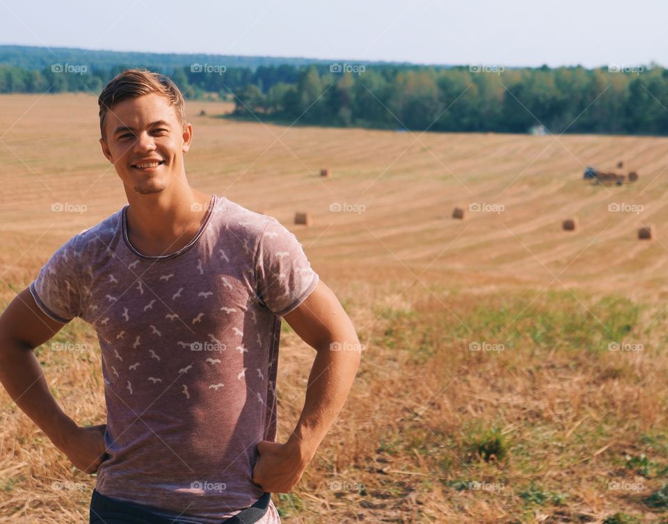 Outdoors man portrait in field