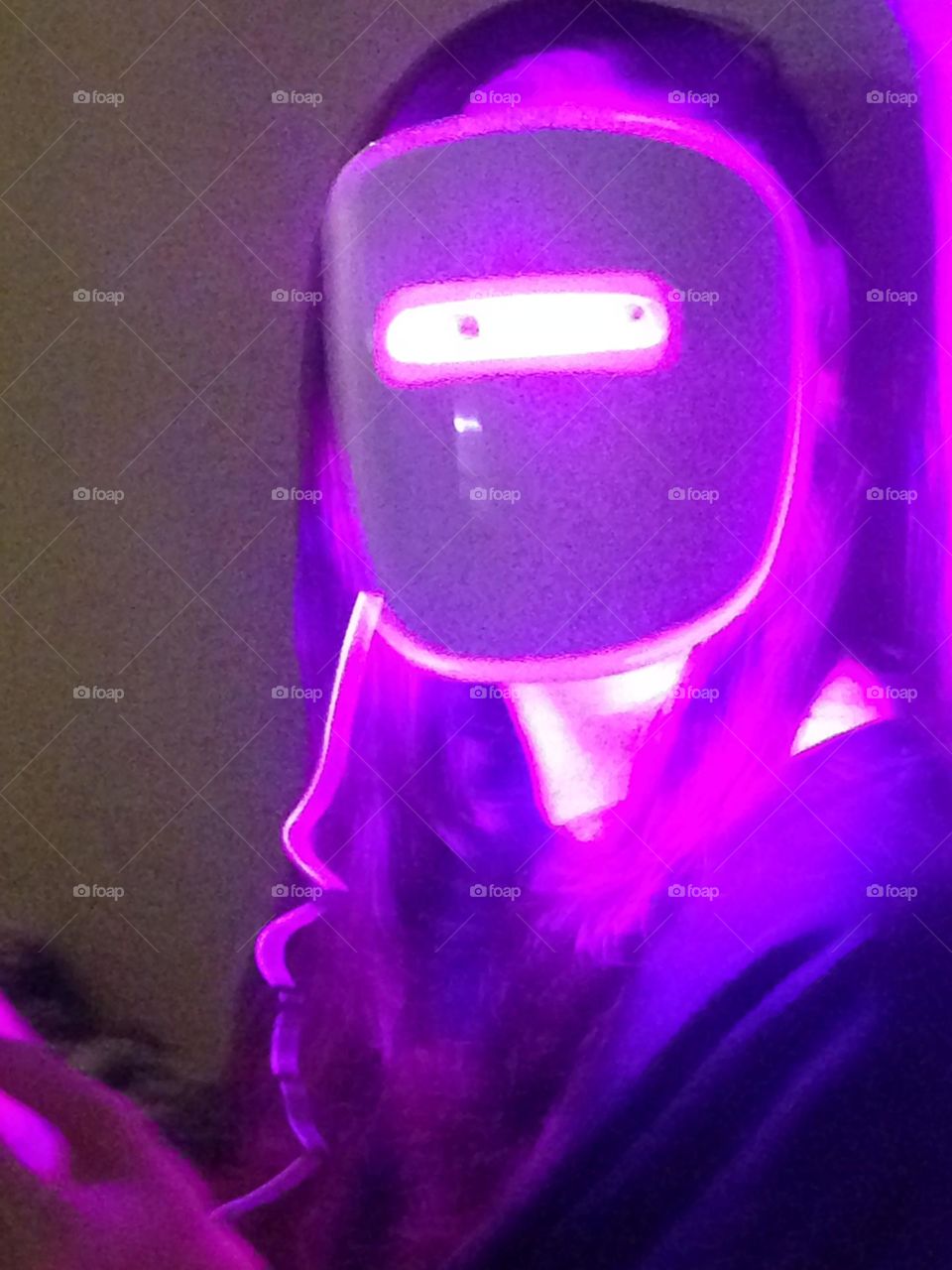 Purple Neutrogena mask for acne. Daughter had to have it! It glows with a purple light and did work!