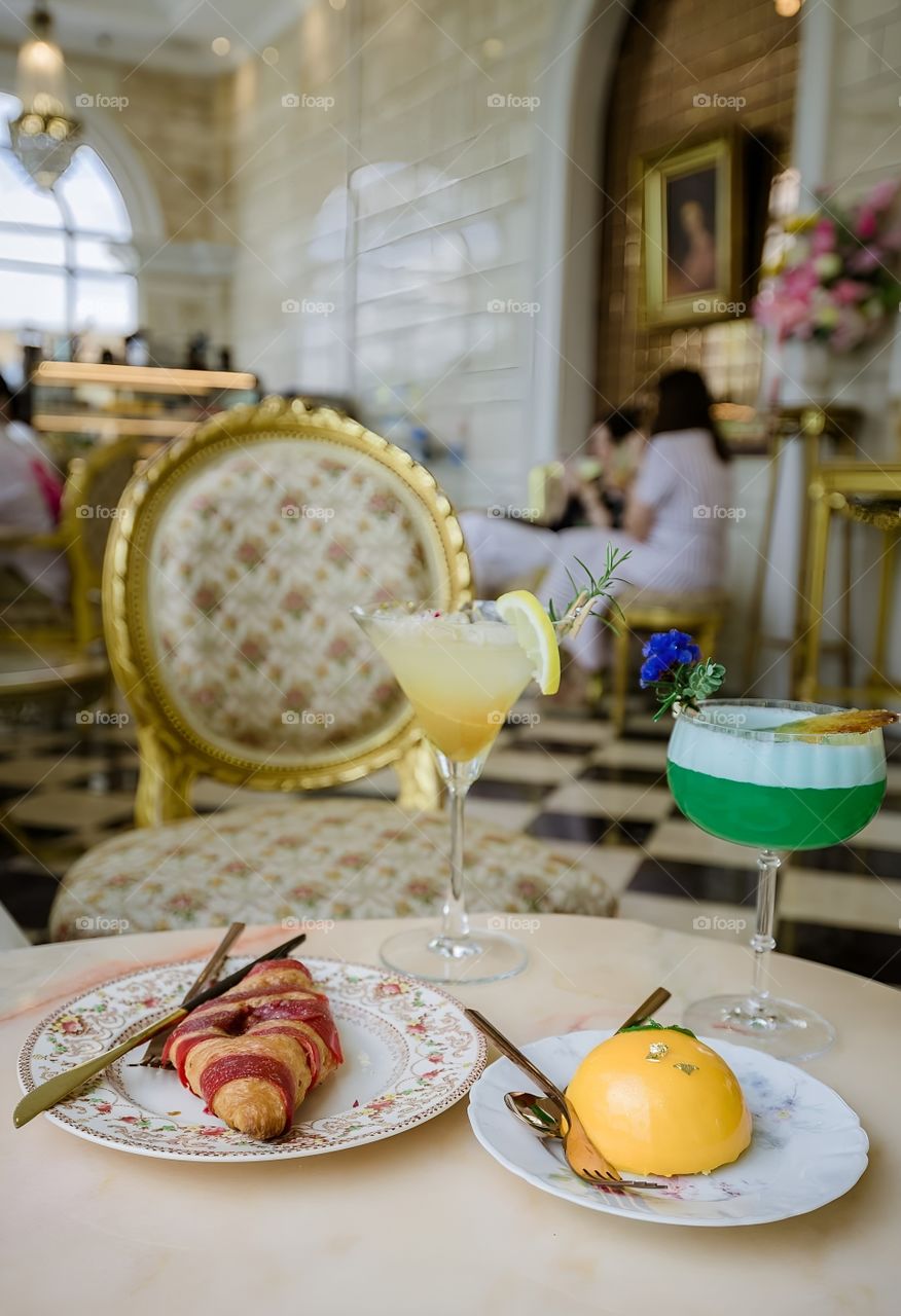 Croissant and lemon cake in the restaurant