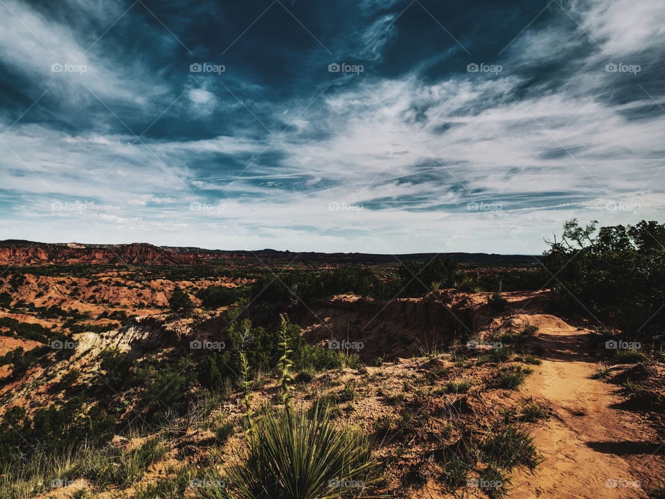 Canyon Land. Dramatic skies over Caprock Canyon state park. 