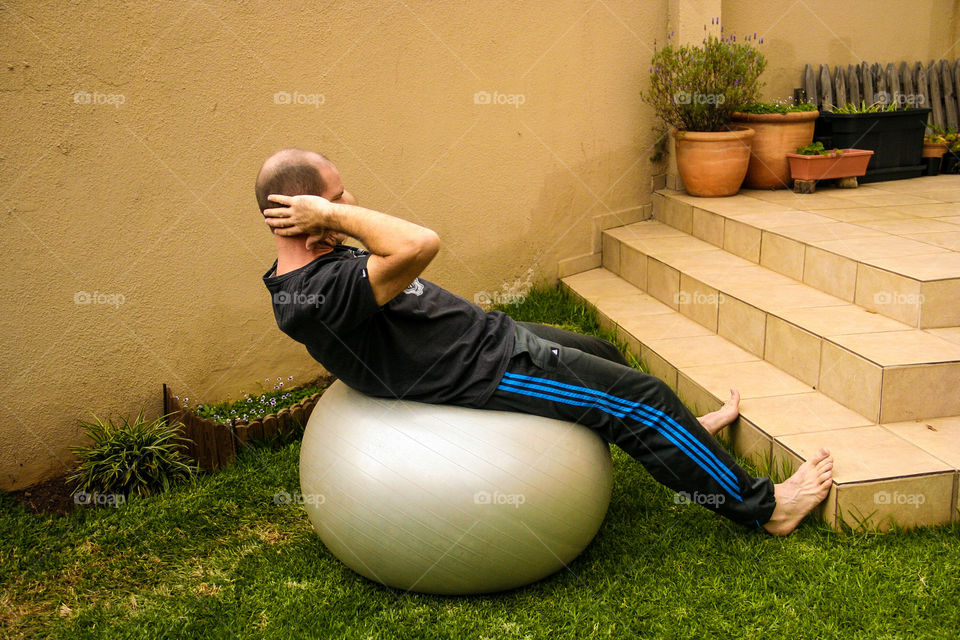 Keeping fit during this forced Covid 19 lockdown period is important. Ball sit-ups are good for maintaining postural control