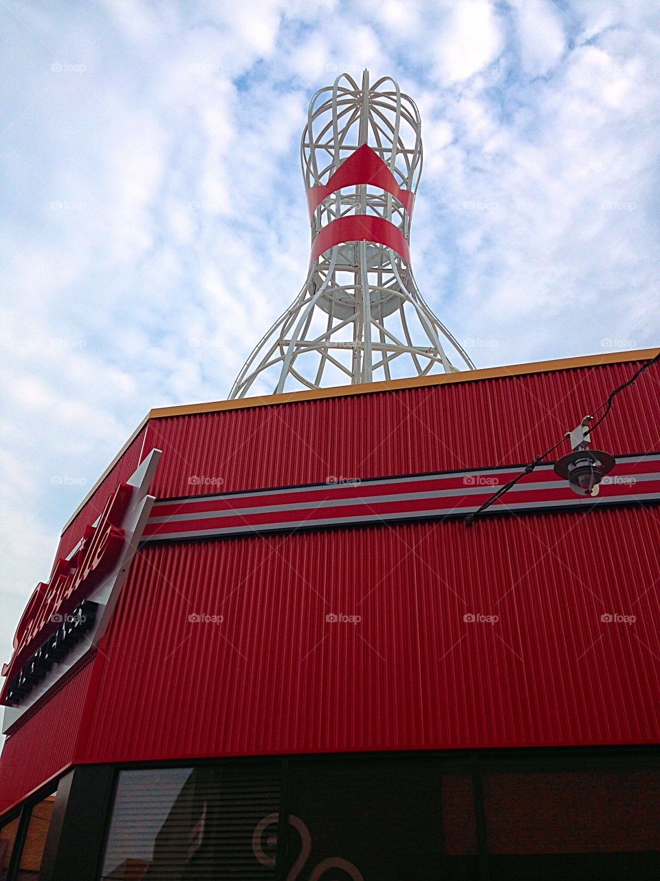 Don't look now.... But there's a giant bowling pin up on that roof - looking up mission 
